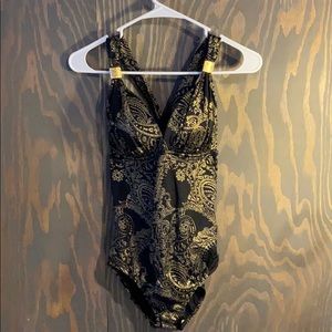 Venus gold filigree on black swimsuit gold metal